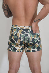 Camouflage fleece shorts for men in green brown and white tones featuring a soft fleece material