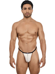 Pikante Nut G-string in beige with black trim and a vertical center seam, worn by a man against a white background.
