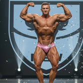 MetroMaleWear posingwear pink crack posing suit shiny pink satin brief with white number 20 patch on the front