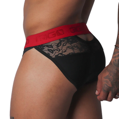 Black brief with floral lace paneling and a contrasting red elastic waistband featuring the Gigo logo.