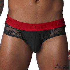 Black jock thong with floral lace side panels and a wide red elastic waistband featuring the Gigo logo.
