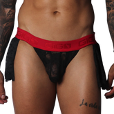 Black lace Gigo mini skirt with a red branded elastic waistband and sheer floral pattern detail.