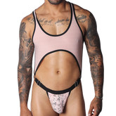 Romantic pink ribbed mesh bodysuit with black trim, a large midriff cutout, and a pink floral lace thong pouch.