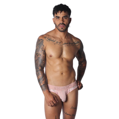 Romantic pink jockstrap with ribbed front pouch, white lace side panels, and a branded elastic waistband.