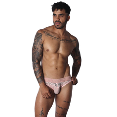 Soft pink brief with a sheer floral lace waistband and matching pouch, featuring a bold, branded elastic logo band.