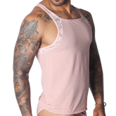 Romantic pink, ribbed-texture tank top with delicate lace trim along the neckline and armholes.