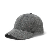 Gray tweed speckled baseball cap with herringbone pattern structured crown and curved brim