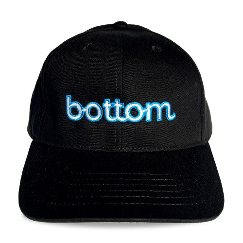 Black Spunky Monkee cap with glowing blue embroidered bottom logo on front panel for casual wear