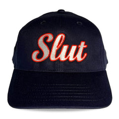 Black cotton spunky monkee cap embroidered with slut in red and white thread on the front panel