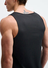 Back view of a man wearing a black ST33LE Textured Stretch Mesh Performance Tank against a white background.