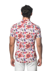 A vibrant garden print stretch knit shirt with bold red and purple floral pattern on white short-sleeve fabric
