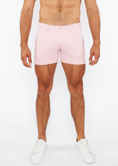 Pink linen-look textured men’s shorts with clean tailored fit and zip pockets featuring subtle stitching details
