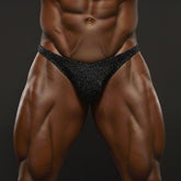 Black glittery briefs with a sleek form-fitting design from MetroMaleWear posingwear Stardust posing suit collection