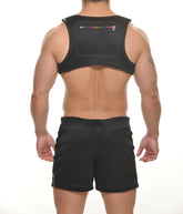 Black sleeveless neoprene colt vest harness back support with rectangular zippered pocket and rainbow zipper pull