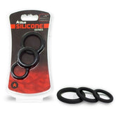 Titus 3-pack of black silicone rings in packaging and lined up side by side.