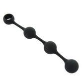 Black silicone weighted anal beads with four graduated spheres and a pull ring handle on a white background.
