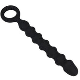 Black ribbed silicone novelty toy with pull ring on a white background.