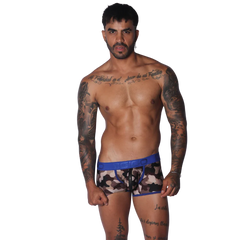 Men's camouflage print trunk with a blue branded elastic waistband and a decorative vertical front zipper.