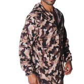 Gigo Trend Jacket in beige and brown camouflage print, featuring a lightweight windbreaker style with a hood and zip.