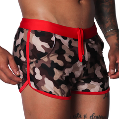 Men's camouflage print swim shorts with red trim, elastic waistband, and matching drawstring.