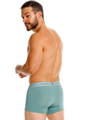 Teal unico 26040100121 ceramic trunks unisex briefs with light gray waistband and dark purple brand lettering