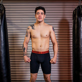Black sheath v men’s 8-inch sports performance boxer brief with red greek key waistband for athletic use