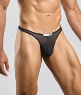Black sheer mesh thong with white justin and simon label at waistband from the classic tanga mesh collection