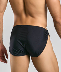 Justin + Simon running short black sleek swim trunks with tailored fit and side-tie design for comfortable wear