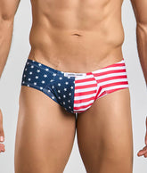 Blue and red american flag-patterned briefs with white stars and stripes featuring justin simon brand label