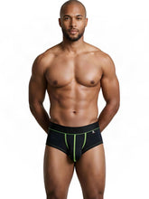 Black microfiber trunks with neon green contrast stitching and a branded elastic waistband.