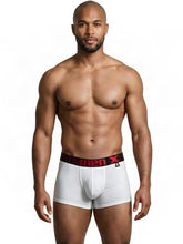 White microfiber trunks featuring a black waistband with bold red "Xtremen" text.