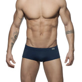 Navy blue ad basic sunga briefs with a subtle logo on the waistband designed for comfortable swimwear use