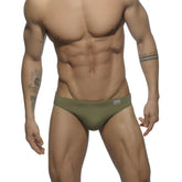Olive green ad basic swim brief with subtle logo on waistband designed for comfortable swimwear use