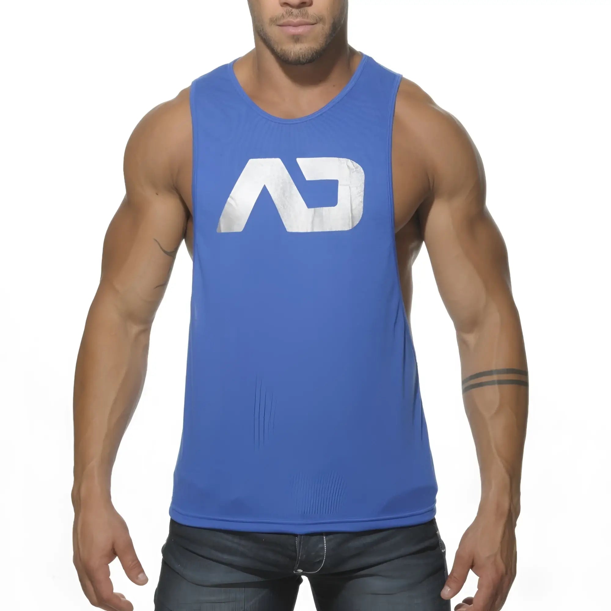 Blue sleeveless athletic tank top with white distressed ad logo on chest designed for low rider style and active use