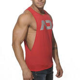 Red muscle tank top with silver ad logo and side cutout for low rider style and active wear