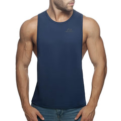Navy blue sleeveless athletic tank top with small chest logo designed for high-performance workouts ad low rider model
