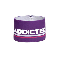 Purple elastic wristband bracelet with bold white addicted lettering and thin red stripe size one size