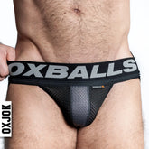 Black airmesh jockstrap briefs with a gray oxballs logo on the waistband made of breathable mesh material