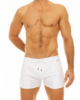 White along slit swim short with drawstring waistband and subtle brand logo on the side for comfortable swimming