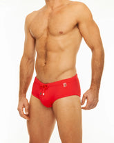Red along solid swim brief with drawstring waistband and small logo on the side for swimwear use