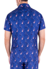 Blue short-sleeved button-up anchoring in hawaii shirt with pink and white abstract pattern perfect for summer wear