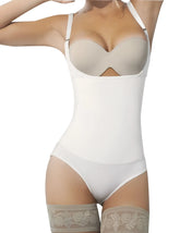 Ann chery latex body bikini in beige with white seamless body shaper and lace trim at the thigh area