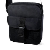 Black athletic crossbody bag with mesh panels and buckle closure designed for tactical and sports use