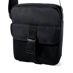 Black athletic crossbody bag with mesh panels and buckle closure designed for tactical and sports use