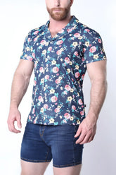 Men’s navy blue balboa button down shirt with short sleeves and vibrant pink white and light green floral pattern