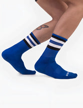 Royal blue barcode berlin fetish stripes half socks with black and white striped cuffs ribbed texture and kathmandu logo on heel