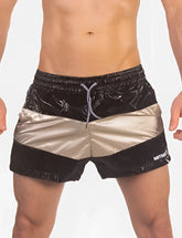 Barcode Berlin Patrick paneled shorts black and gold striped shiny reflective swim trunks size L front view