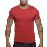 Red basic v-neck short-sleeved t-shirt with a subtle logo on the left chest perfect for casual wear