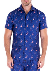 Blue short-sleeved button-up anchoring in hawaii s s shirt with a repeating pink and white floral pattern