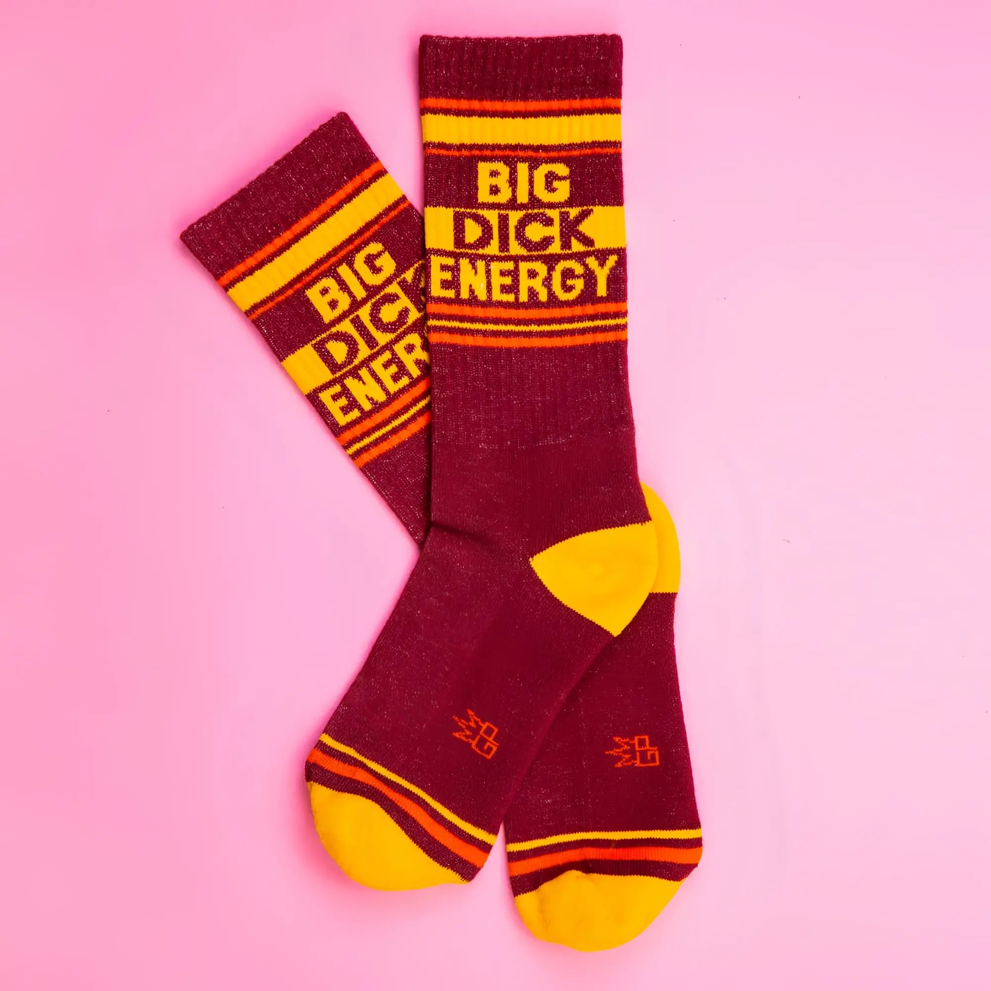 Maroon and yellow big dick energy crew socks with orange stripes designed for bold everyday wear